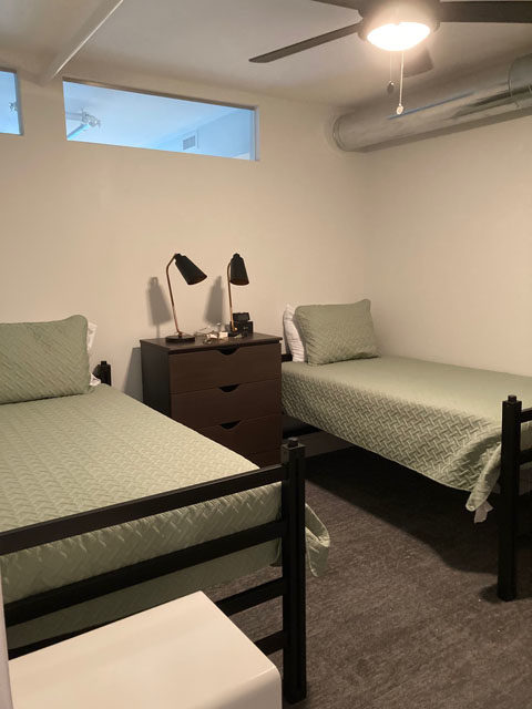 two beds in a small room