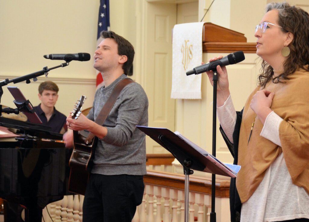 modern worship service singers at church